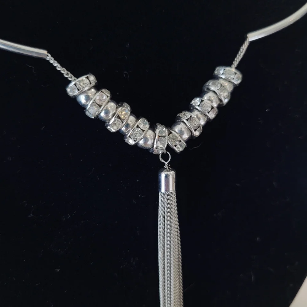 Unusual Silvertone Bolero-Rodeo choker with Long tassle Tail